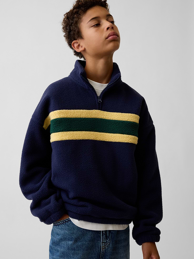 Image 1 of 1, Soft sherpa pullover. In a relaxed fit., Mockneck with quarter-zip closure., Long sleeves with drop shoulders., Pieced stripes at front., Elasticized cuffs and hem., This product was made in a factory that invests in gender equity and women’s empowerment through RISE. Learn more at gapinc.com/equity ., Product #1184266