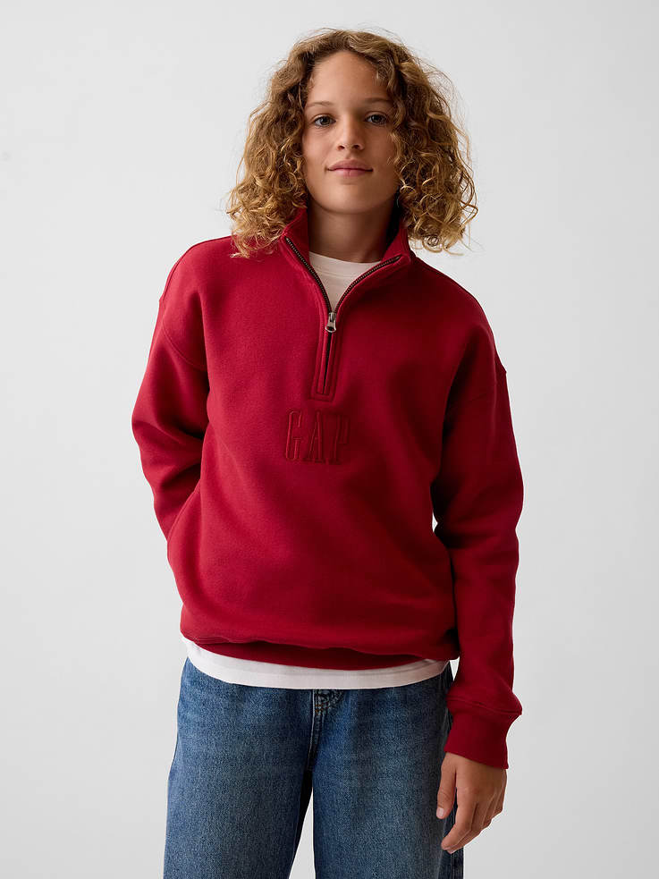 Image 1 of 5, Our softer than soft sweats. Brushed on the inside. Smooth on the outside. Made so that no two are alike., Soft cotton-blend fleece pullover. In a relaxed fit., Mockneck with quarter zip closure., Long sleeves., Gap embroidered logo at front., Banded hem and cuffs., Made with 23% recycled polyester. Compared to virgin materials, using recycled materials helps reduce resource use and waste., This product was made in a factory that invests in gender equity and women’s empowerment through RISE. Learn more at gapinc.com/equity ., Product #1184267