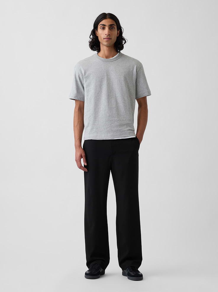 Image 1 of 7, Our soft-structured, effortless essential that works all day, every day., Smooth, stretch woven trousers. In a loose fit and mid rise., E-waist with button closure, zip fly., Front slant pockets, back button-welt pockets., Made with 63% recycled polyester. Compared to virgin materials, using recycled materials helps reduce resource use and waste., Product #1186530
