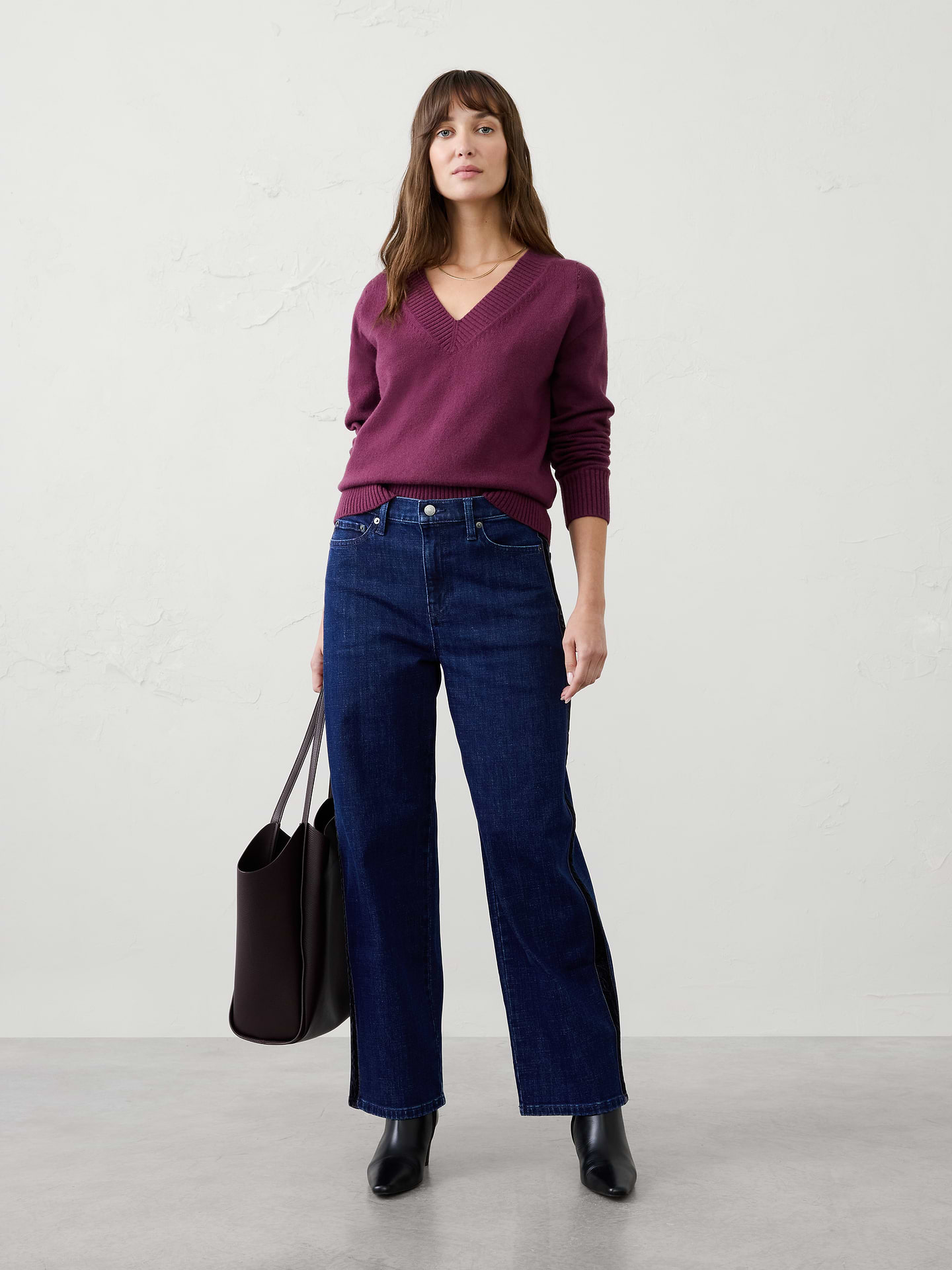 Image 1 of 3, Refresh your denim collection with this straight-fit high-rise jean, elevated by a striking velvet side-stripe detail. Crafted in a flattering high-rise silhouette, this customer-favorite style combines the timeless appeal of classic denim with a refined touch of texture., WASHWELL: This jean is part of our water-saving Washwell program. Compared with conventional wash methods, Washwell uses at least 20% less water., Fitted. High rise. Straight leg. Full length., Shank button closure with zip fly. Belt loops., Traditional five-pocket design., Velvet side-stripe detail adds elevated style., Made exclusively for Banana Republic Factory., Product #1181437