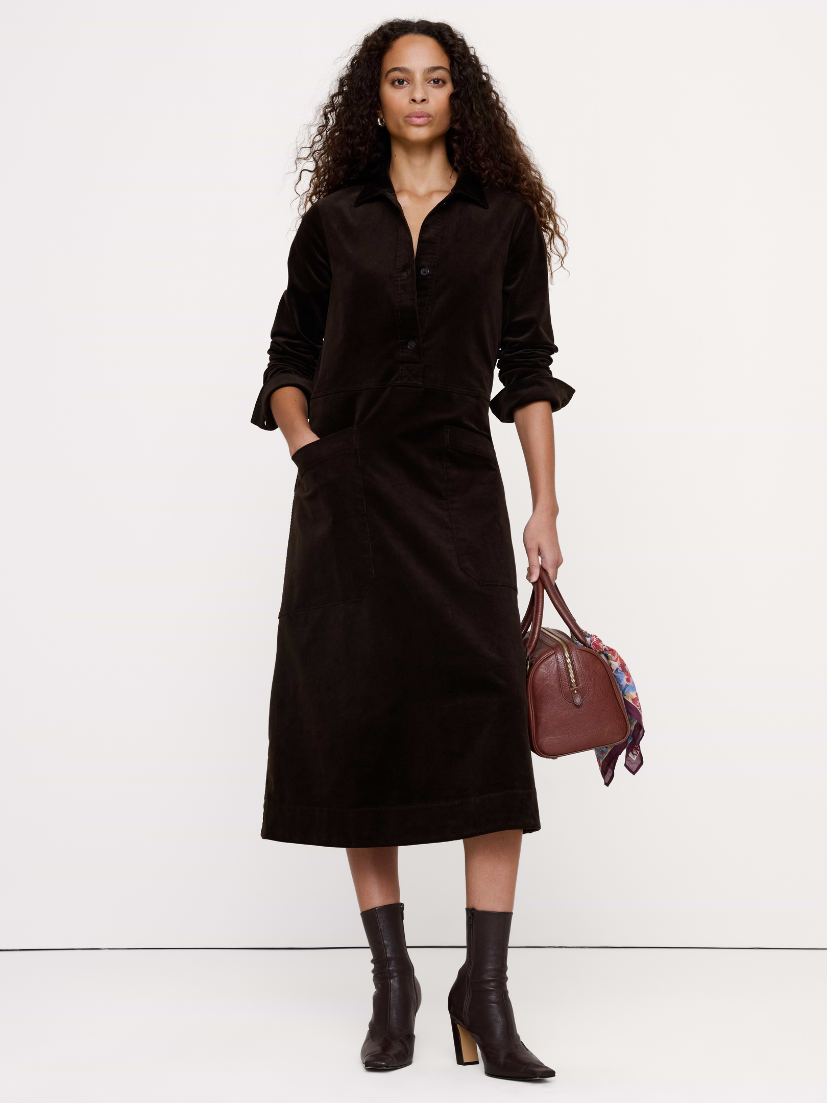 Image 1 of 7, We love a dress that blurs the line between feminine and edgy. Here, we used a fine wale corduroy with just a hint of stretch and added utilitarian details. Plus, it's specially washed for softness., Trapeze Fit: An easy fit with an A-line silhouette., Point collar with button placket. Bra friendly., Adjustable tabs at back., Patch pockets., Unlined., Product #1180152