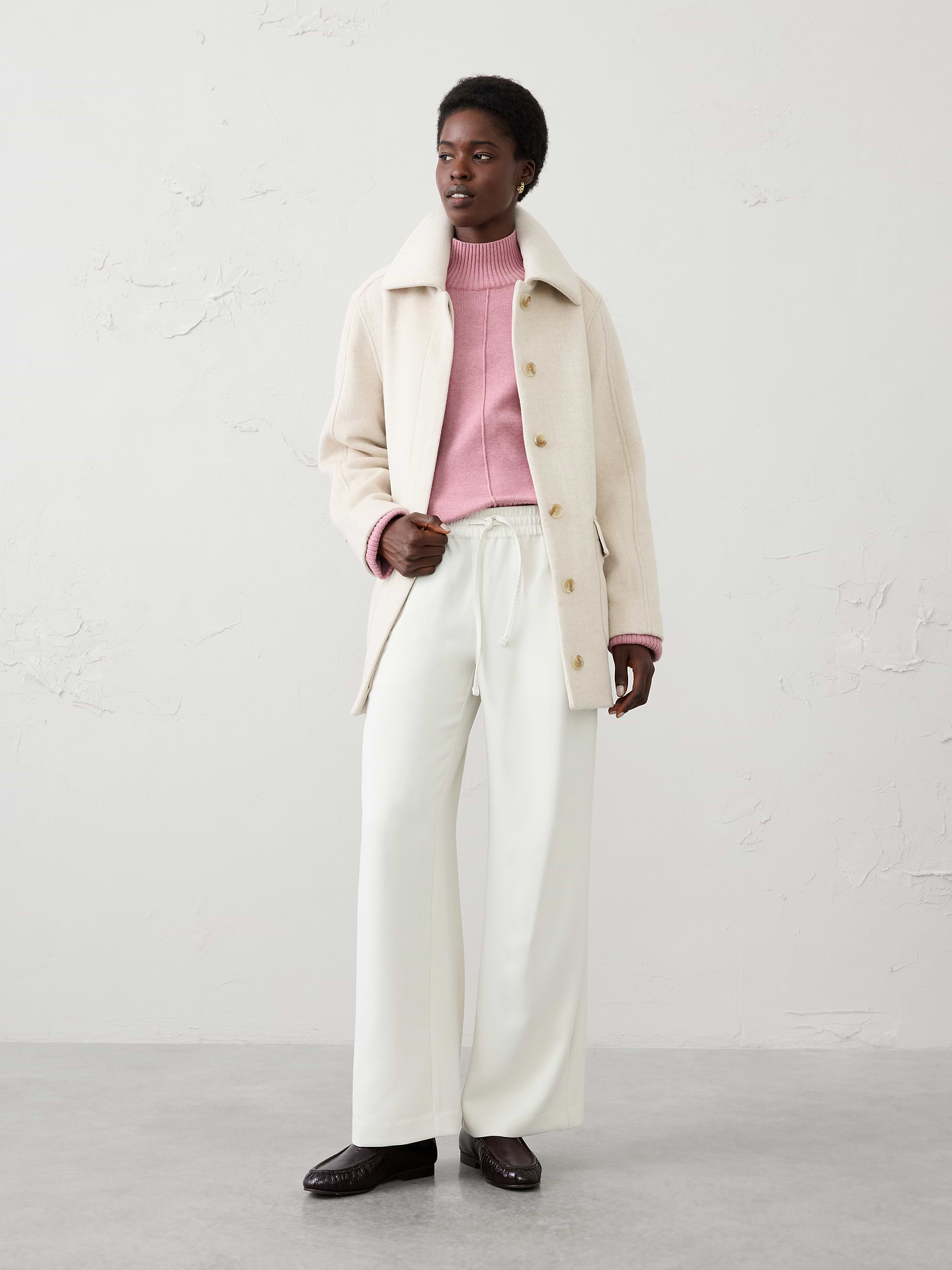 Image 1 of 5, The perfect blend of comfort and polish, this pull-on crepe pant is designed for effortless everyday versatility. Crafted from a fluid crepe fabric, it features a flattering mid-rise fit and a clean silhouette that transitions seamlessly from work to weekend. Whether dressed up with a blazer or styled casually with a knit top, this pant is a go-to staple for any occasion., SUSTAINABILITY: Made with 100% recycled polyester., Pull-on pant. Adjustable drawstring waistband., On-seam side pockets., Back welt pockets., Soft trouser crease., Made exclusively for Banana Republic Factory., Product #1182227