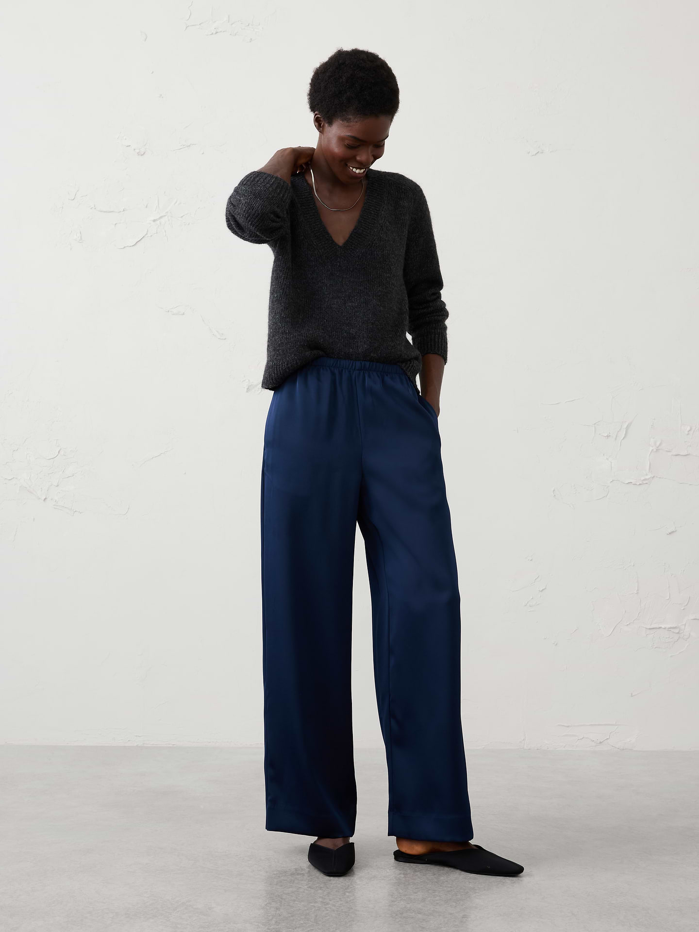 Image 1 of 1, Effortlessly elegant and endlessly versatile, our satin pant is designed to take you from casual gatherings to special occasions with ease. Crafted from lightweight satin fabric with a fluid drape and subtle sheen. The pull-on design offers effortless wear, while the clean, streamlined look makes it easy to dress up with heels for a party or pair with a cozy sweater and flats for a more relaxed approach., Pull-on pant. Elasticized waistband., Relaxed wide-leg silhouette., Made exclusively for Banana Republic Factory., Product #1182237