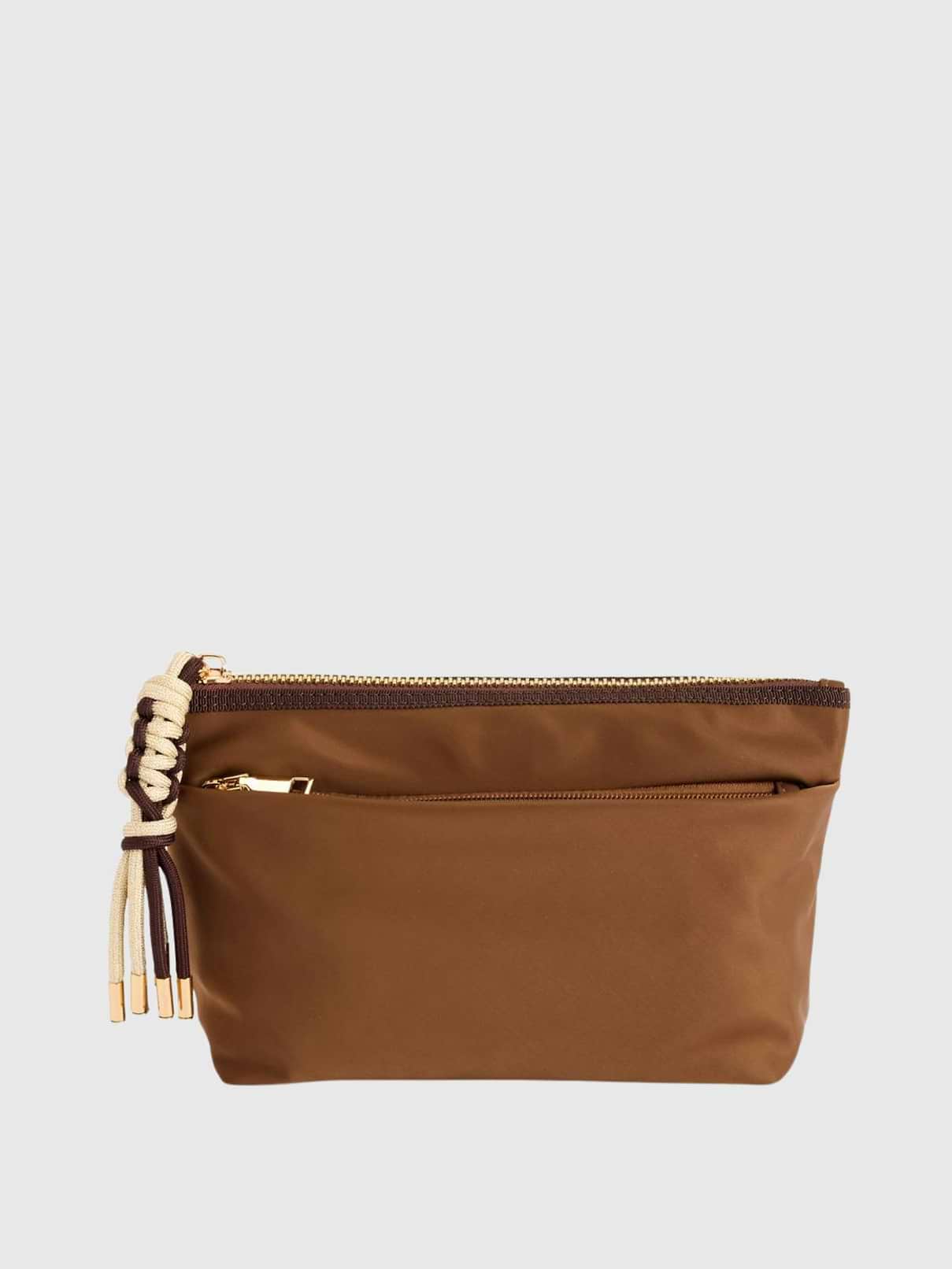 Image 1 of 2, Take your on-the-go organization to new heights with the Jet Zip Pouch., This sleek and sporty design features a top zip closure, one inner zip pocket, two inner slip pockets, and a convenient outer zip pocket for easy access., It’s crafted from durable nylon and accented with eye-catching paracord zipper pulls and gold hardware., Whether stashing travel essentials, tech accessories, or everyday must-haves, the Jet Zip Pouch keeps it all zipped up in style.
