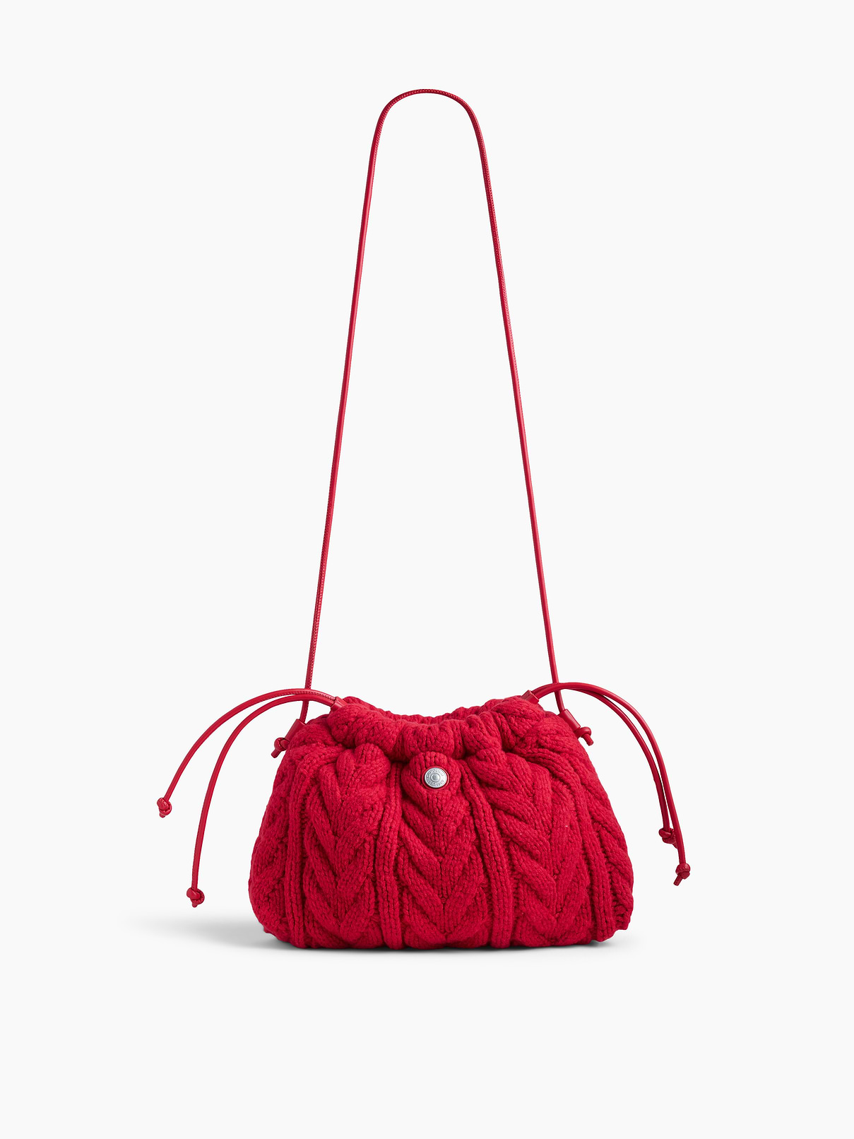 Image 1 of 6, Supersoft cable-knit pouchette., Worn hand-held, crossbody or over-the-shoulder., Shoulder strap., Drawcord closure at top., Product #1186129