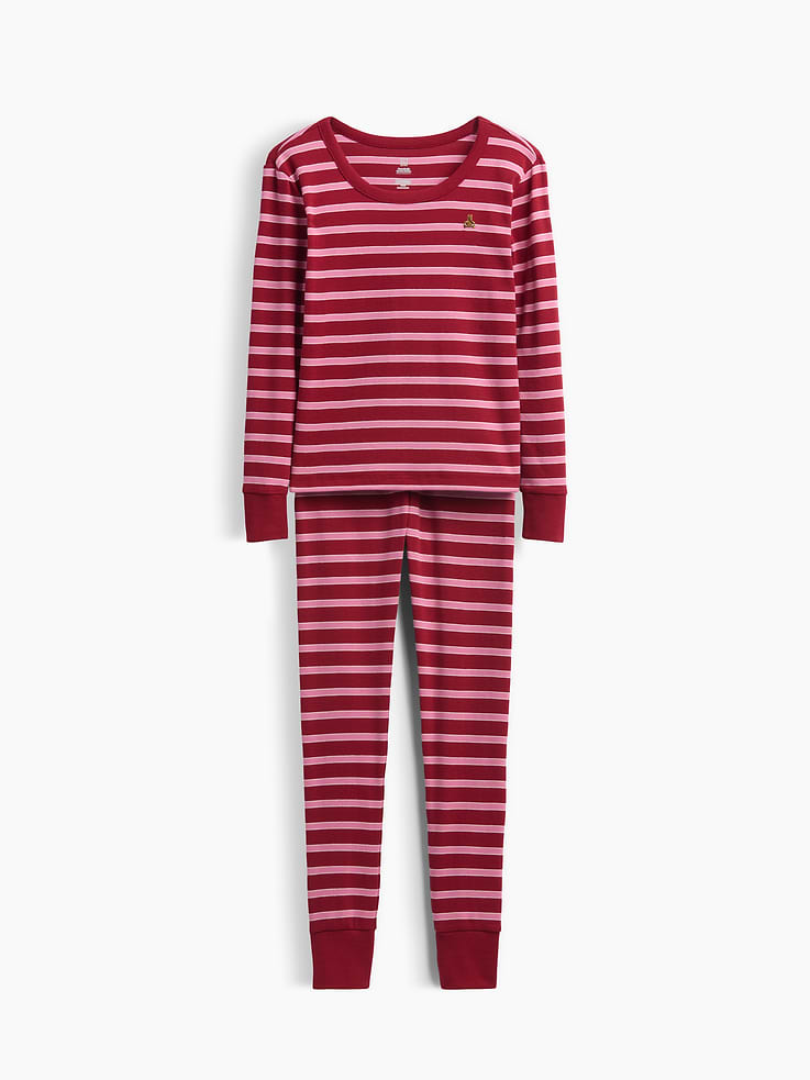 Image 1 of 3, Our comfiest PJs—now softer than ever. Cozy brushed cotton on the inside. All their favorite prints & colors on the outside., Soft cotton jersey pajama top and pants PJ set with a cozy brushed interior., Crewneck., Long sleeves., Elasticized waist at PJ pants., Banded cuffs., Allover print., Made with 100% organically grown cotton which is grown without the use of synthetic pesticides and fertilizers., Shop matching PJs for all., This product was made in a factory that invests in gender equity and women’s empowerment through RISE. Learn more at gapinc.com/equity ., Product #915891