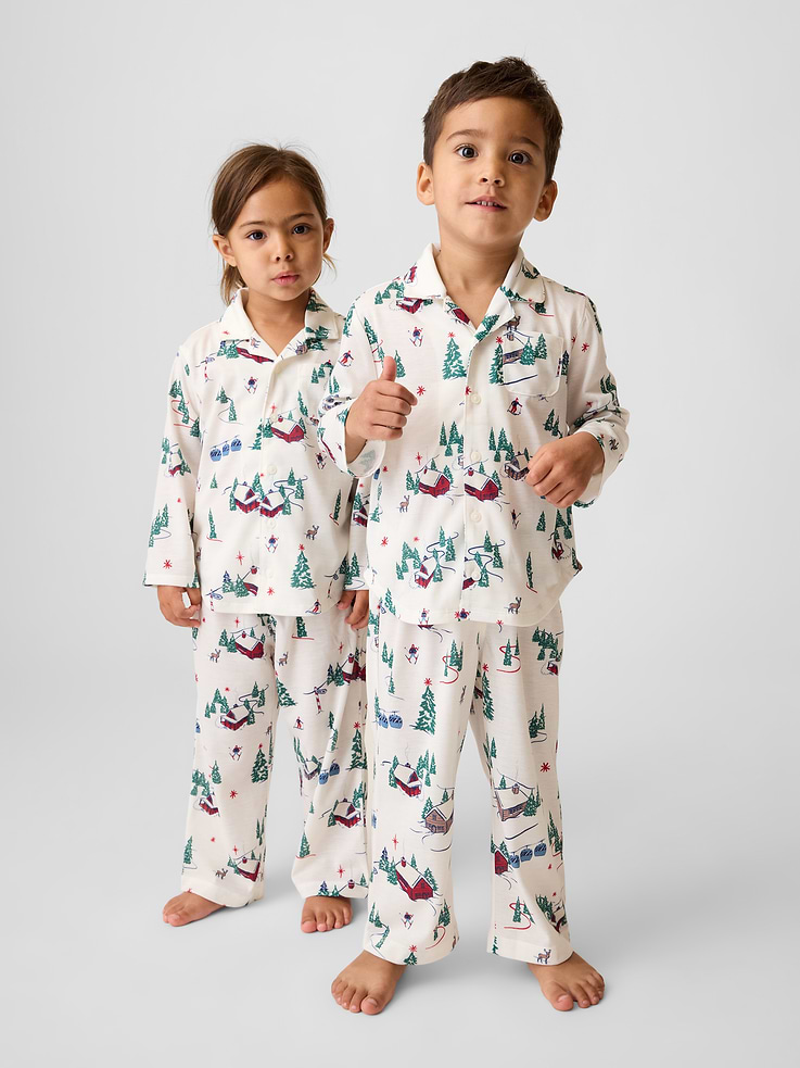 Image 1 of 3, Soft knit jersey pajama shirt and pants PJ set., Notch collar., Long sleeves., Button front., Chest patch pocket with embroidered Brannan Bear., Piping detail at edges., Shirttail hem., Elasticized waist at PJ pants., Made with 100% recycled polyester. Compared to virgin materials, using recycled materials helps reduce resource use and waste., Shop matching PJs for all., Product #915912