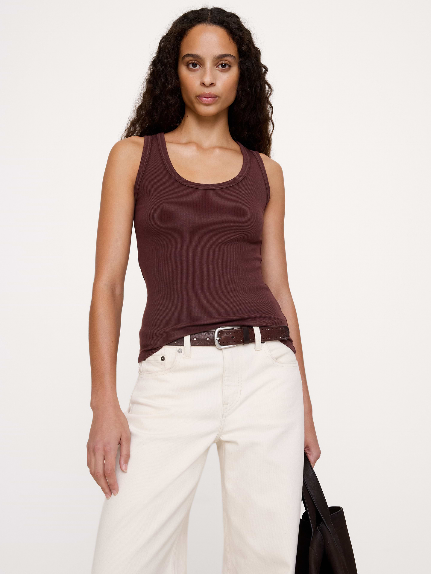 Image 1 of 8, There's so much to love about this tank: the just-right length, the body-conscious fit, and the ultra-soft ribbed fabric., Stretches to fit., Scoop neck., Straight hem., Product #872921