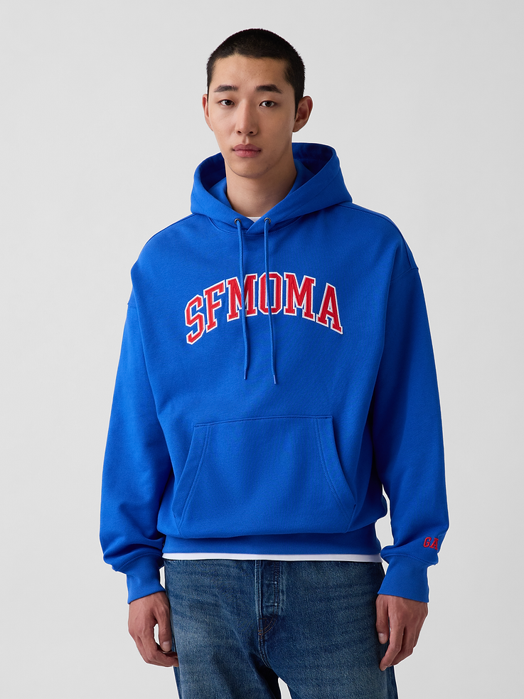 Image 1 of 9, Soft, heavyweight cotton-blend hoodie. In an oversized fit., Hooded neckline with drawcords., Long sleeves with mini embroidered Gap logo., SFMOMA arch logo at front., Kanga pocket., Banded hem and cuffs., Product #1191151