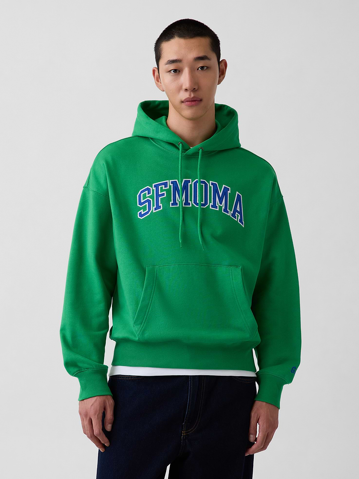 Image 1 of 9, Soft, heavyweight cotton-blend hoodie. In an oversized fit., Hooded neckline with drawcords., Long sleeves with mini embroidered Gap logo., SFMOMA arch logo at front., Kanga pocket., Banded hem and cuffs., Product #1191151