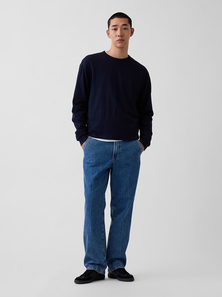 Image 1 of 7, Our quintessential fit, just laid-back and looser., Fit: Slim through the hip & thigh with a relaxed straight leg., Fabric: 100% Cotton., Stretch: No Stretch. Authentic rigid denim that gets better with every wear. Made to wear all day & break in over time. , Look: A four-pocket trouser jean., Details: Zip fly, side slant pockets, and back welt pockets., Responsibly Made: This product is part of our water-saving Washwell program. Compared with conventional wash methods, Washwell uses at least 20% less water., Made with 52% Protocol cotton verified by the U.S. Cotton Trust Protocol, a program which works with farms committed to improving their environmental footprint by minimizing water usage and improving soil health (Claim No. 10127)., Made with 5% recycled cotton. Compared to virgin materials, using recycled materials helps reduce resource use and waste., This product was made in a factory that invests in gender equity and women’s empowerment through RISE. Learn more at gapinc.com/equity ., Product #1184869