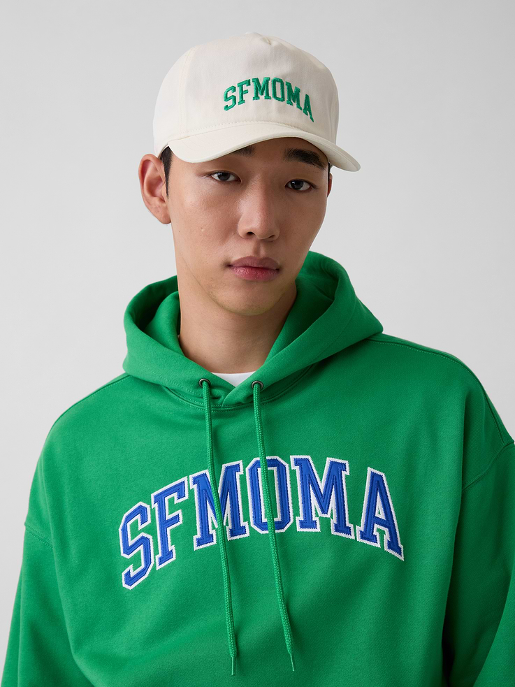 Image 1 of 5, Sturdy cotton baseball hat., Stitching at curved brim., Embroidered SFMOMA arch logo at front., Adjustable closure at back., Product #1191149