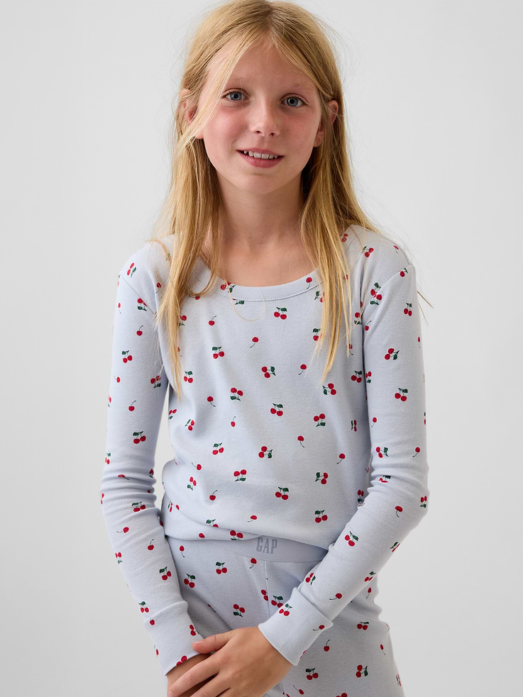 Image 1 of 4, Our comfiest PJs—now softer than ever. Cozy brushed cotton on the inside. All their favorite prints & colors on the outside., Crewneck., Long sleeves., Elasticized waist at PJ pants., Banded cuffs., Allover print., Made with 100% organically grown cotton which is grown without the use of synthetic pesticides and fertilizers., Shop matching PJs for all., This product was made in a factory that invests in gender equity and women’s empowerment through RISE. Learn more at gapinc.com/equity ., Product #915893
