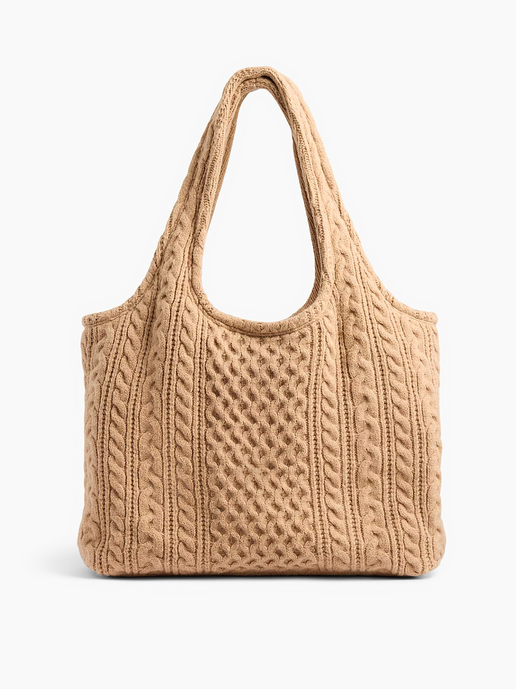 Image 1 of 7, Supersoft tote bag., Worn over the shoulder, elbow, and handheld., Shoulder straps., Snap closure at top., Laptop Friendly: up to 13"., Product #1189027