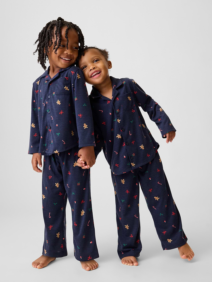 Image 1 of 3, Soft knit jersey pajama shirt and pants PJ set., Notch collar., Long sleeves., Button front., Chest patch pocket with embroidered Brannan Bear., Piping detail at edges., Shirttail hem., Elasticized waist at PJ pants., Made with 100% recycled polyester. Compared to virgin materials, using recycled materials helps reduce resource use and waste., Shop matching PJs for all., Product #915912