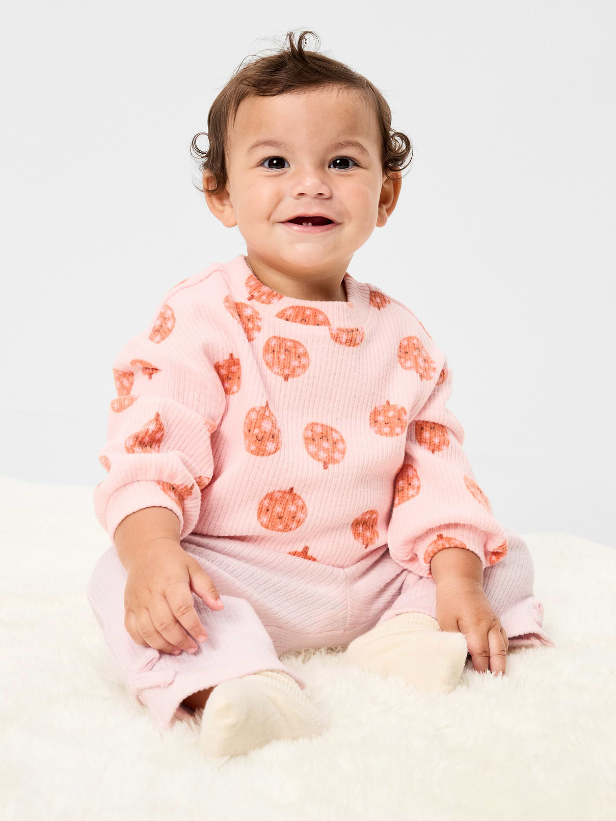 Image 1 of 4, crew neck, long sleeves, cinched hem, coordinating pants, elasticized waistband, wide leg, decorative bow and side slits at hem, Product #908433