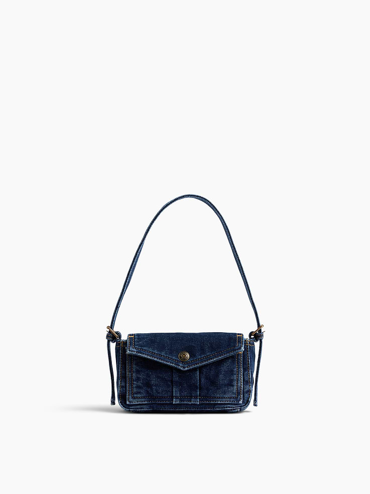 Image 1 of 8, Soft cotton denim envelope shoulder bag., Worn handheld, elbow or over the shoulder., Adjustable shoulder strap., Snap-button envelope flap closure., Product #1189097