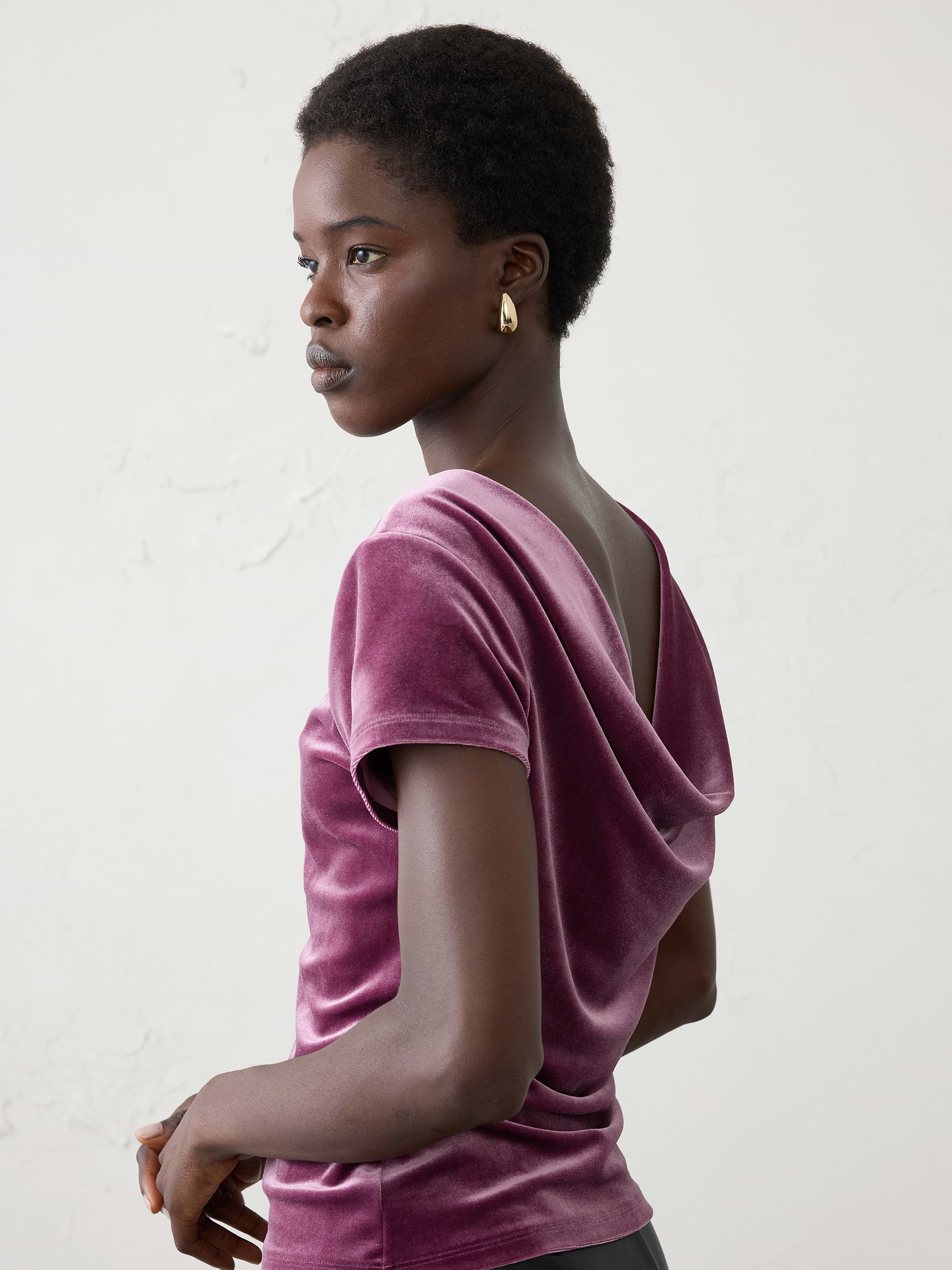 Image 1 of 4, Made from our ultra-soft knit velvet. Designed for comfort and style, it’s the perfect piece to dress up your festive wardrobe., Straight neckline. Short sleeves., Fitted at the waist., Low drapey neckline at back., Made exclusively for Banana Republic Factory., Product #1186005