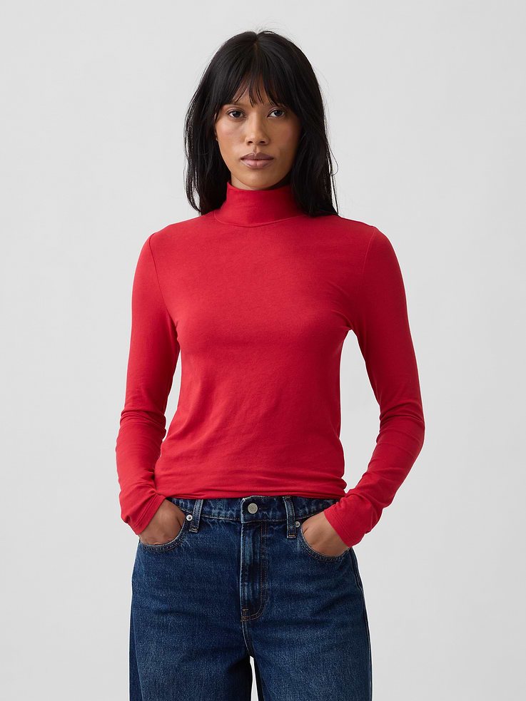 Image 1 of 5, Stretch jersey knit., Long sleeves., Mockneck., Select styles have allover print or stripes., This product was made in a factory that invests in gender equity and women’s empowerment through RISE. Learn more at, Product #1186820