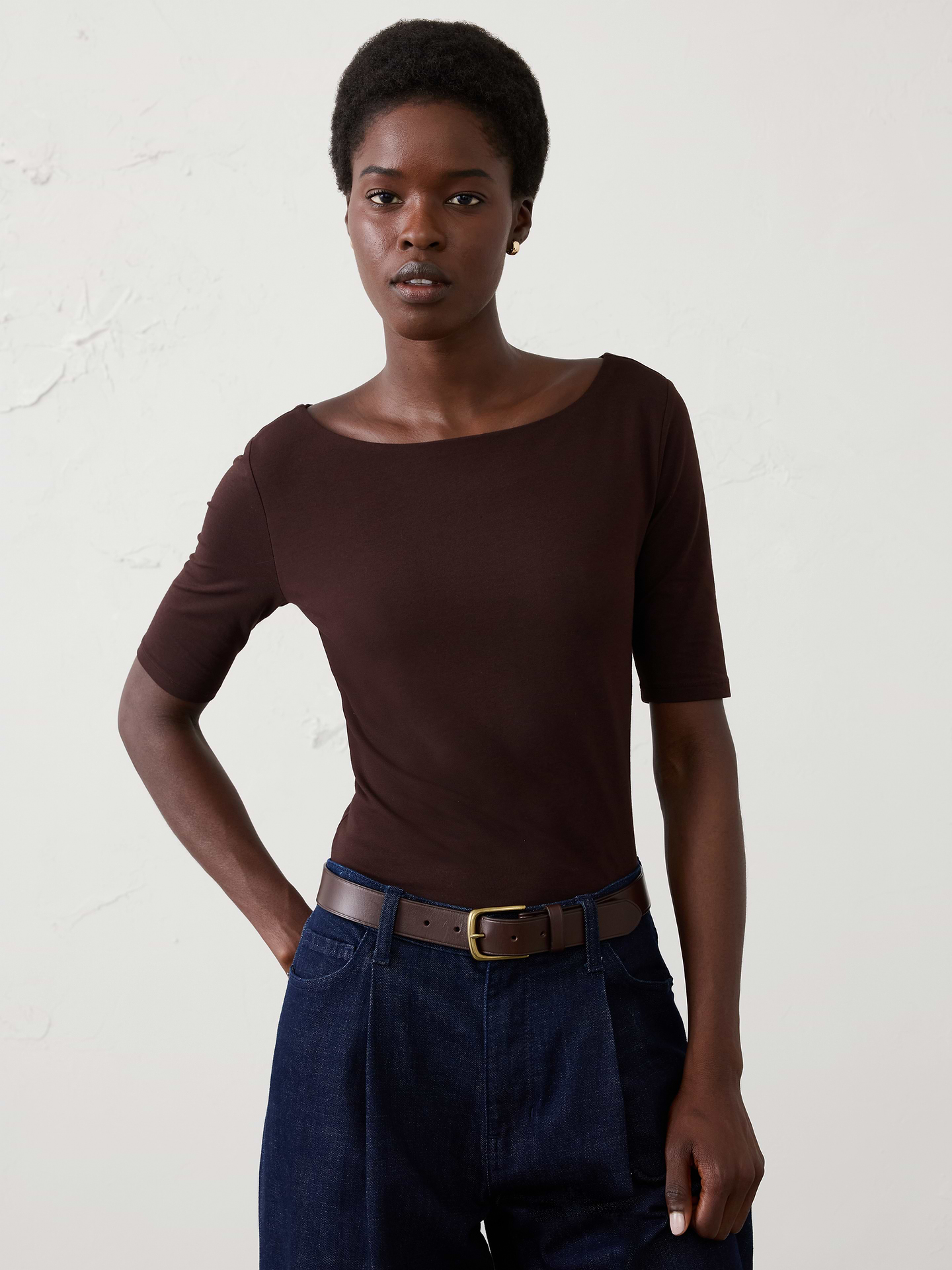 Image 1 of 8, SOFT STRETCH: This fabric is a luxurious blend of cotton that offers exceptional softness and comfort. It features a double-layered construction for a snug fit. This makes it an ideal choice for layering or pairing effortlessly with wide-leg trousers or pants., Excellent piece to wear under a blazer., Crew neck. Elbow length sleeves., Straight hem., Soft stretch., Fully lined., Made exclusively for Banana Republic Factory., Product #885463