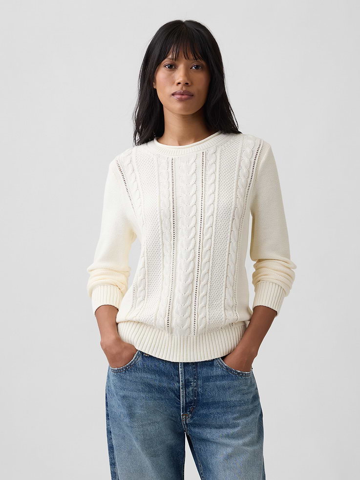 Image 1 of 5, Soft cotton knit., Long sleeves with ribbed cuffs., Rolled crewneck., Ribbed hem., This product was made in a factory that invests in gender equity and women’s empowerment through RISE. Learn more at, Product #1178628