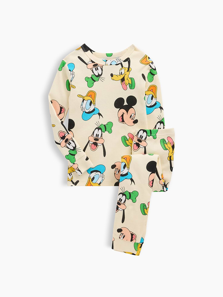 Image 1 of 2, A very special collaboration between Gap and Disney— two timeless, iconic American brands— led us to create a collection that celebrates Mickey Mouse and Minnie Mouse., Soft cotton sleep set., Long sleeves with banded cuffs., Crewneck., Elasticized waist., Banded cuffs., Allover print., Product #1185548