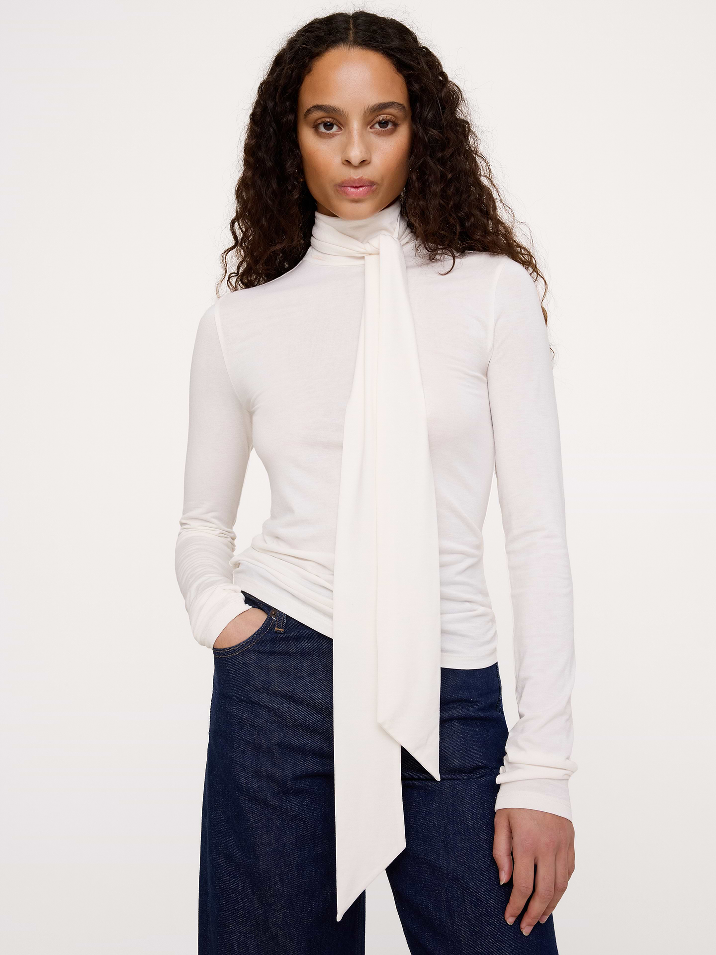 Image 1 of 4, So good, we had to bring it back. This tie-neck turtleneck top is made from a luxuriously soft wool blend, in a weight that's suitable for layering through cooler weather., Fitted: Slim. Sits close to the body., Turtleneck with tie-scarf., Straight hem., Product #1186882