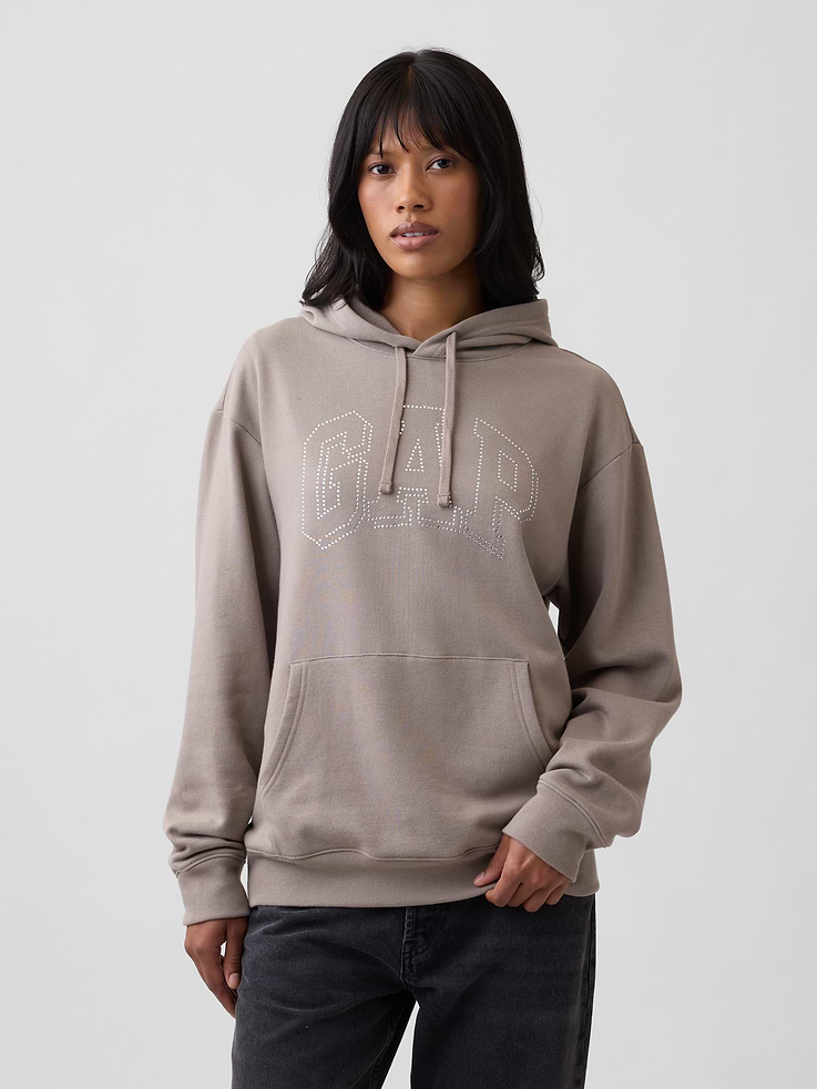 Image 1 of 5, This product is made with/contains 23% recycled polyester. Compared to virgin materials, using recycled materials helps reduce resource use and waste., Soft, comfy fleece., Dropped shoulder, long sleeves with banded cuffs., Drawcord ties at hood., Gap logo at front., Kanga pocket., Banded hem., Note: The dye used in the crafting of this product is prone to crocking, or color transfer. Please avoid contact with light-colored fabric or upholstery., Product #839432