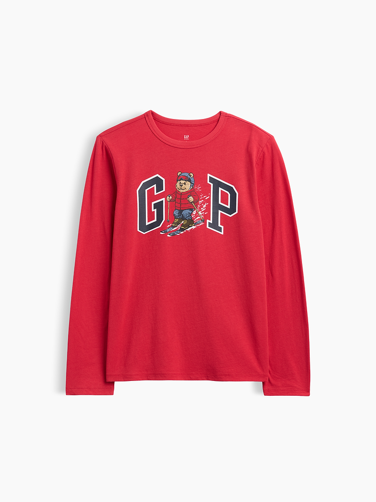 Image 1 of 3, Soft jersey knit., Long sleeves., Crewneck., Gap logo with Brannan Bear graphic at front., This product was made in a factory that invests in gender equity and women’s empowerment through RISE. Learn more at, Product #1194922