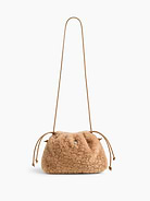 Image 1 of 6, Soft sherpa pouchette bag., Worn hand-held, crossbody or over-the-shoulder., Vegan leather shoulder strap., Drawcord closure at top., Product #1186132