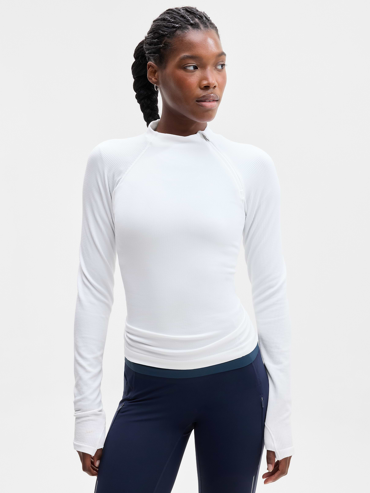 Image 1 of 3, FOR: Training in cold weather climates, FEEL: Seamless construction for maximum comfort and minimal chafing, FAVE: Thumbholes hold sleeves in place and keep warmth in, Product #1178765