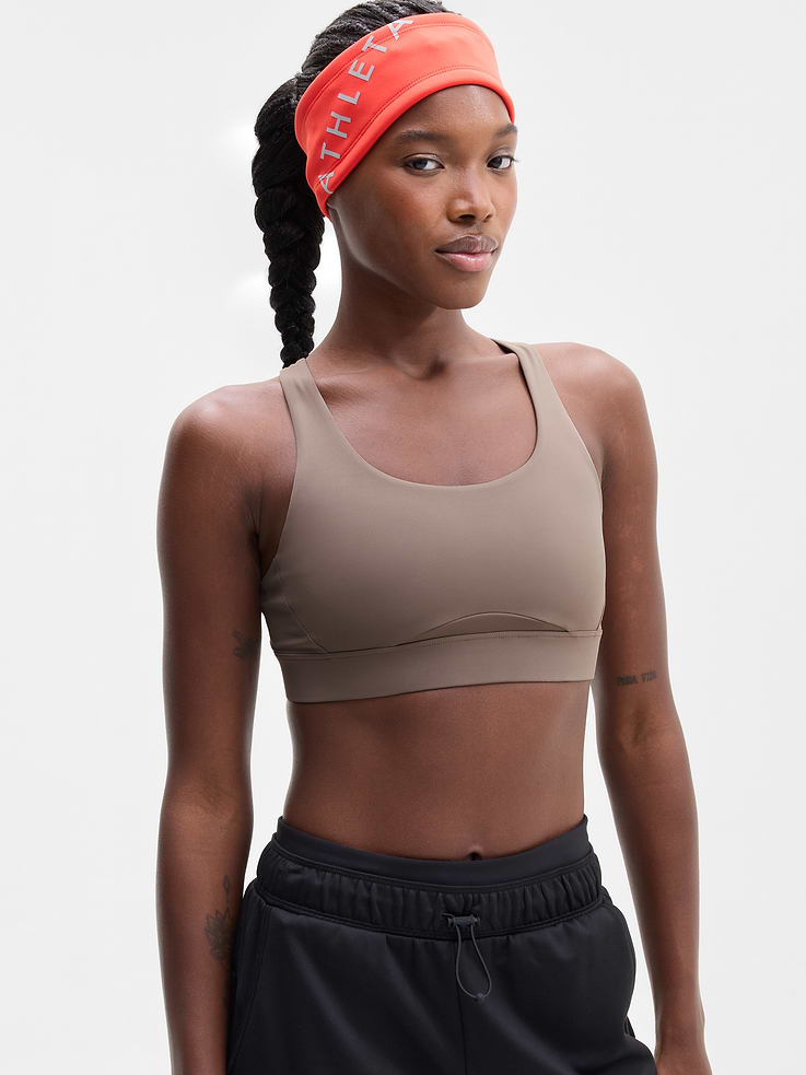 Image 1 of 4, BEST FOR CARDIO: run + train + HIIT, IMPACT: Medium-impact workouts, best for D-DD cups, FEEL: PowerMove fabric is sleek, weightless, and helps keep you cool with quick-drying properties, FAVE: Stay-put straps and shaping seams for a secure, sculpted fit, Built-in pockets with removable pads for optional coverage, Removable pads hold their shape from wash to wear, Lined with PowerMesh for breathable, sheer-proof coverage, Easily pairs with the Empower Mastectomy Bra Insert, Product #413267