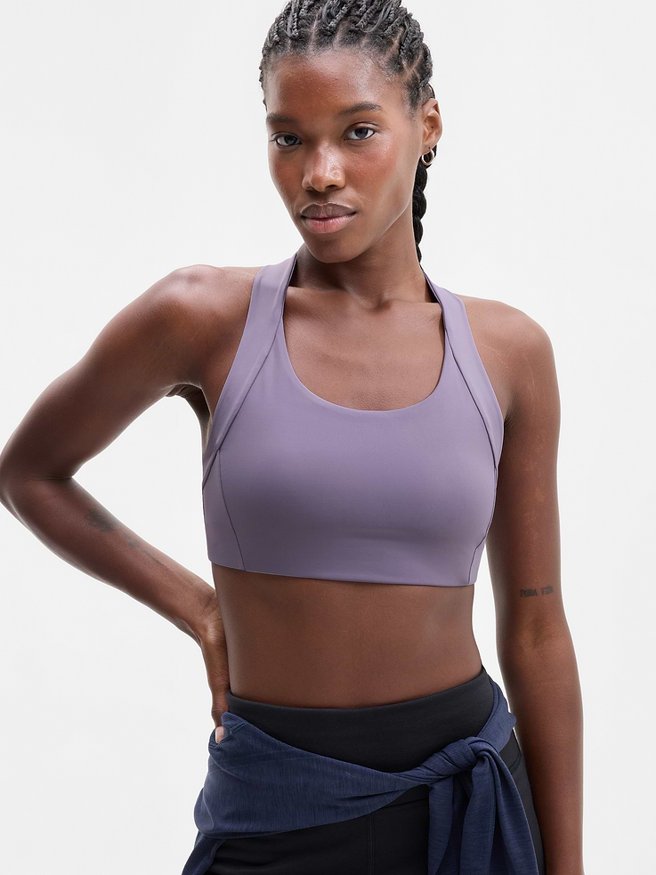 Image 1 of 4, BEST FOR CARDIO: run + train + HIIT, IMPACT: Medium-impact workouts, best for D-DD cups, FEEL: PowerMove fabric is sleek, weightless, and helps keep you cool with quick-drying properties, FAVE: Back mesh detail offers optimal breathability, Built-in pockets with removable pads for optional coverage, Product #1179322