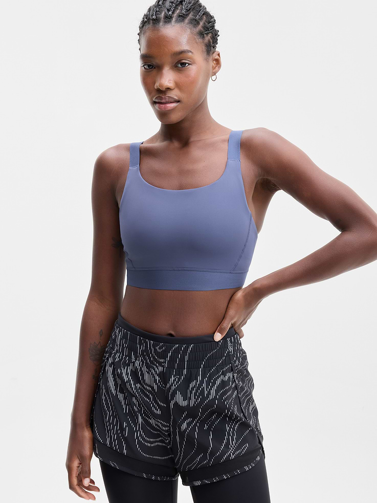 Image 1 of 4, BEST FOR CARDIO: run + train + HIIT, IMPACT: Medium-impact workouts, best for D-DD cups, FEEL: PowerMove fabric is sleek, weightless, and helps keep you cool with quick-drying properties, FAVE: Adjustable straps for a customizable fit, Product #1174503