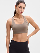 Image 1 of 3, BEST FOR CARDIO: run + train + HIIT, IMPACT: Medium-impact workouts, best for A-C cups, FEEL: PowerMove fabric is sleek, weightless, and helps keep you cool with quick-drying properties, FAVE: Back mesh detail offers optimal breathability, Built-in pockets with removable pads for optional coverage, Product #1178724