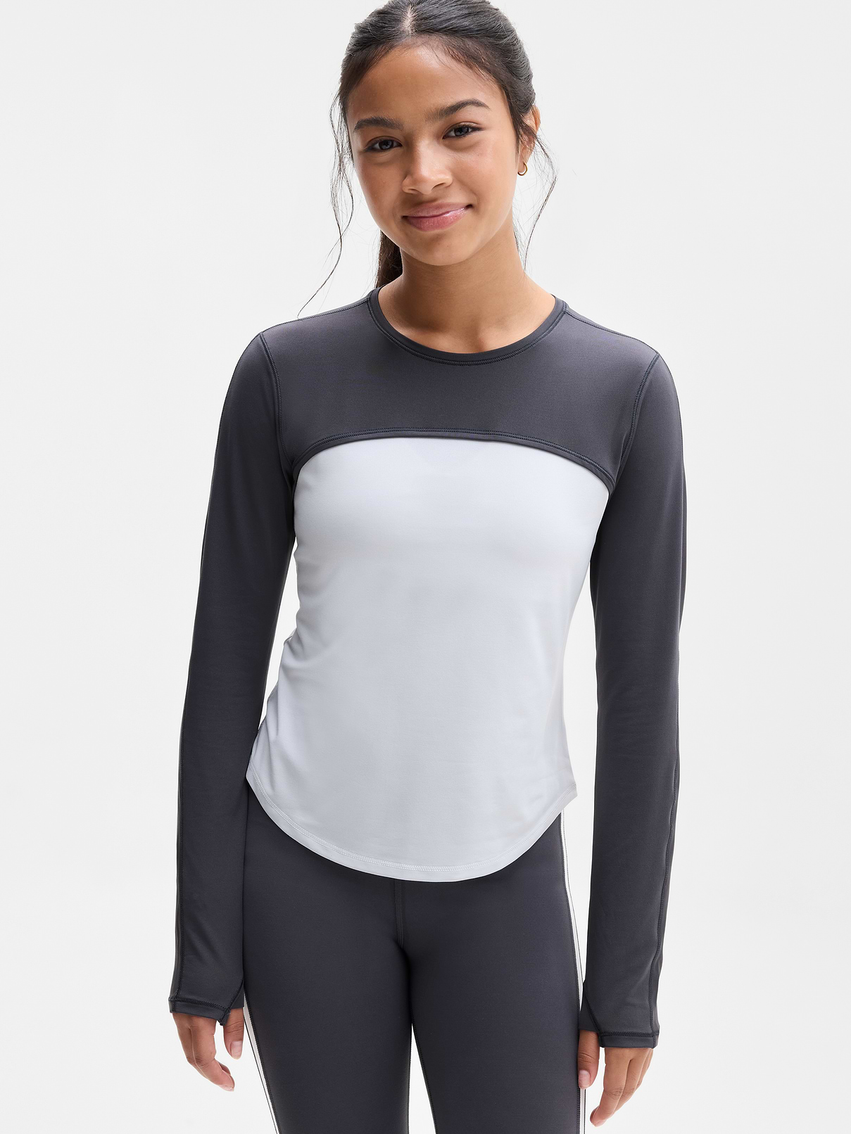 Image 1 of 3, FOR: School, practice, and play, FEEL: Lightweight, breathable for performance, FAVE: Thumbholes hold sleeves in place and keep warmth in, Product #1183454