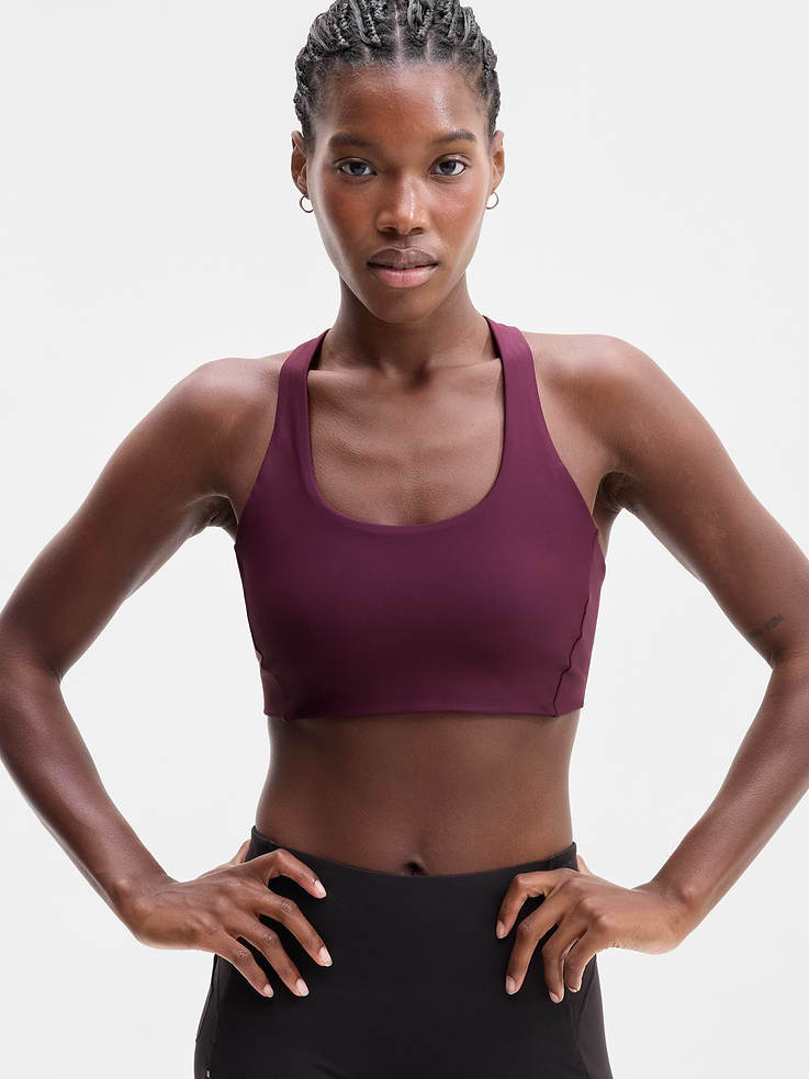 Image 1 of 5, BEST FOR CARDIO: run + train + HIIT, IMPACT: Medium-impact workouts, best for D-DD cups, FEEL: PowerMove fabric is sleek, weightless, and helps keep you cool with quick-drying properties, FAVE: Dual cross-back straps and shaping seams for a secure, sculpted fit, Removable pads hold their shape from wash to wear, Lined with PowerMesh for breathable, sweat-proof coverage, Product #864107
