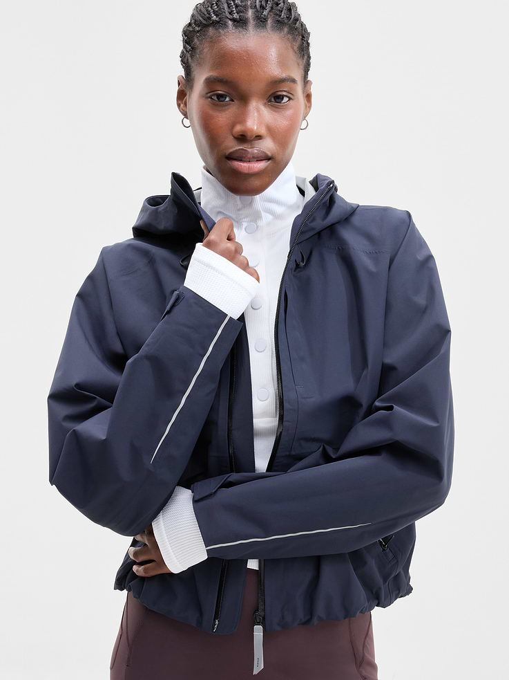 Image 1 of 8, FOR: Outdoor runs in cold, wet weather, FEEL: Sleek, 2.5-layer fabric offers extra durability, FAVE: Waterproof center-front and side-pocket zippers, Bungee-adjustable hood and hem customize the fit, Product #1178723