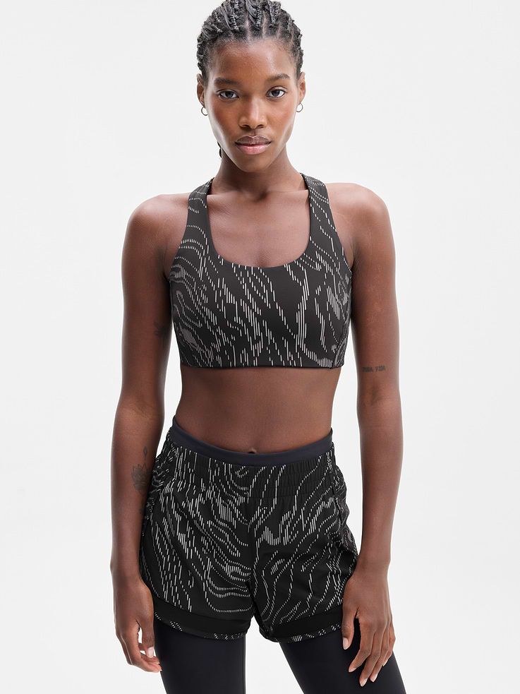 Image 1 of 4, BEST FOR CARDIO: run + train + HIIT, IMPACT: Medium-impact workouts, best for D-DD cups, FEEL: PowerMove fabric is sleek, weightless, and helps keep you cool with quick-drying properties, FAVE: Dual cross-back straps and shaping seams for a secure, sculpted fit, Removable pads hold their shape from wash to wear, Lined with PowerMesh for breathable, sweat-proof coverage, Product #864107