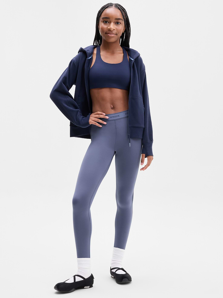 Image 1 of 4, FOR: Ultimate confidence on every field, in every room, in every way, FEEL: Powervita fabric is buttery soft with support that feels like a gentle hug, FAVE: Elastic waistband stays put for her every move, Product #1181586