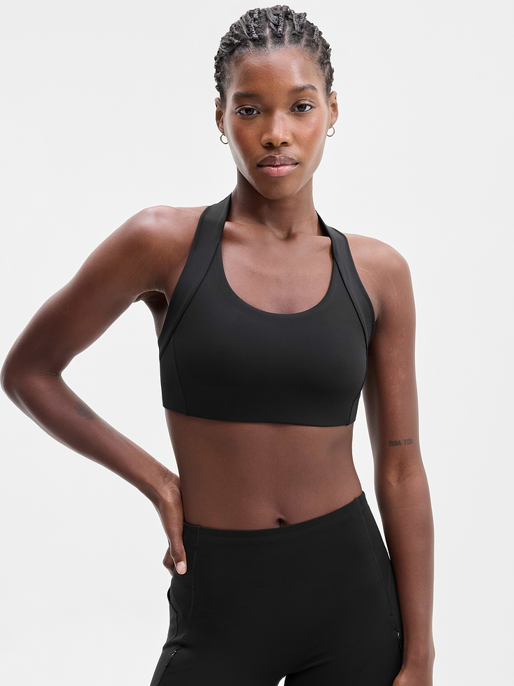 Image 1 of 4, BEST FOR CARDIO: run + train + HIIT, IMPACT: Medium-impact workouts, best for D-DD cups, FEEL: PowerMove fabric is sleek, weightless, and helps keep you cool with quick-drying properties, FAVE: Back mesh detail offers optimal breathability, Built-in pockets with removable pads for optional coverage, Product #1179322