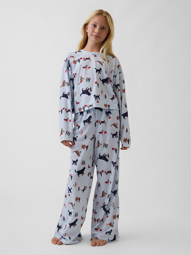 Image 1 of 4, Soft jersey knit pajama top and pants set., Crewneck., Long sleeves., Elasticized waist at PJ pants., Wide leg., Allover print., Made with 100% recycled polyester. Compared to virgin materials, using recycled materials helps reduce resource use and waste., This product was made in a factory that invests in gender equity and women’s empowerment through RISE. Learn more at gapinc.com/equity ., Product #915902