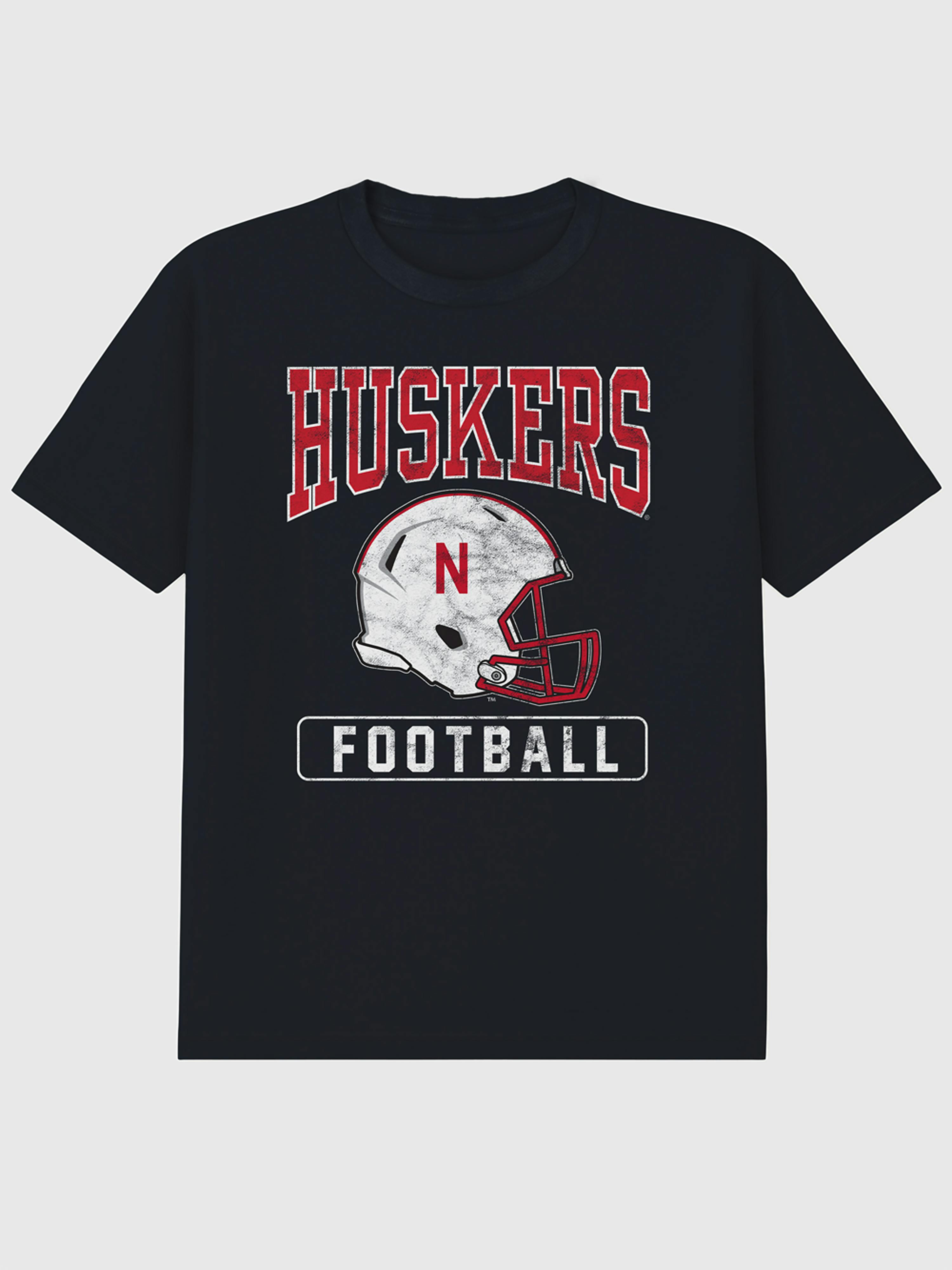 Image 1 of 4, 6oz Heavyweight T-shirt., Relaxed, contemporary fit., Hits at the hip., Crewneck., Short sleeves., Officially licensed University Of Nebraska Football Helmet graphic at the front. Trevco partners with Gap on DTC licensed merch from the coolest brands, TV shows, and movies. Trusted by more than 1, 200 brands worldwide and 600+ American colleges & universities, Trevco is a premier provider of officially licensed apparel., This item is printed on demand.