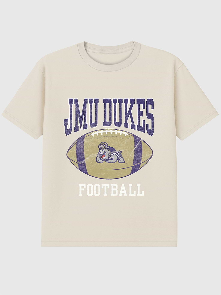 Image 1 of 4, 6oz Heavyweight T-shirt., Relaxed, contemporary fit., Hits at the hip., Crewneck., Short sleeves., Officially licensed James Madison University Football graphic at the front. Trevco partners with Gap on DTC licensed merch from the coolest brands, TV shows, and movies. Trusted by more than 1, 200 brands worldwide and 600+ American colleges & universities, Trevco is a premier provider of officially licensed apparel., This item is printed on demand.