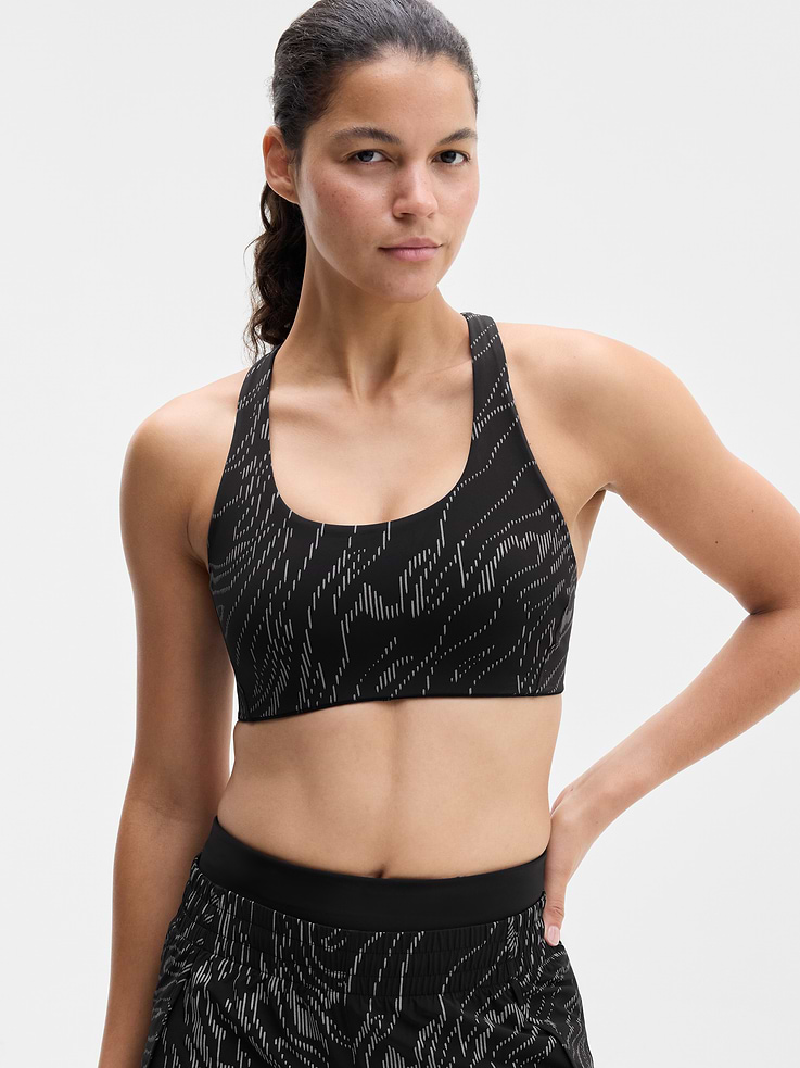 Image 1 of 5, BEST FOR CARDIO: run + train + HIIT, IMPACT: Medium-impact workouts, best for A-C cups, FEEL: PowerMove fabric is sleek, weightless, and helps keep you cool with quick-drying properties, FAVE: Dual cross-back straps and shaping seams for a secure, sculpted fit, Removable pads hold their shape from wash to wear, Lined with PowerMesh for breathable, sweat-proof coverage, Product #864108