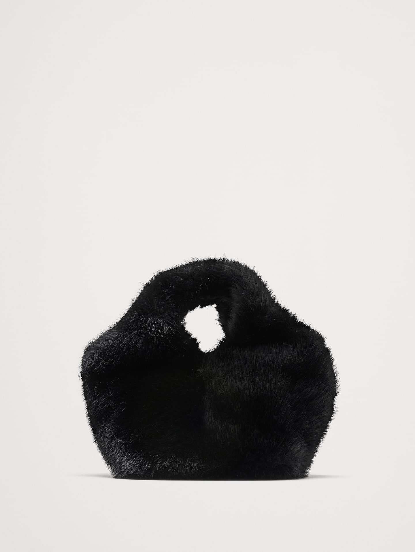 Image 1 of 8, Not just for show. This mini handheld bag is functional enough for brunches, date nights, and everything in between., Hat Attack: Crafting sustainable, stylish hats & accessories since 1981. Family-run, with modern designs rooted in artisanal heritage., Product #1187278