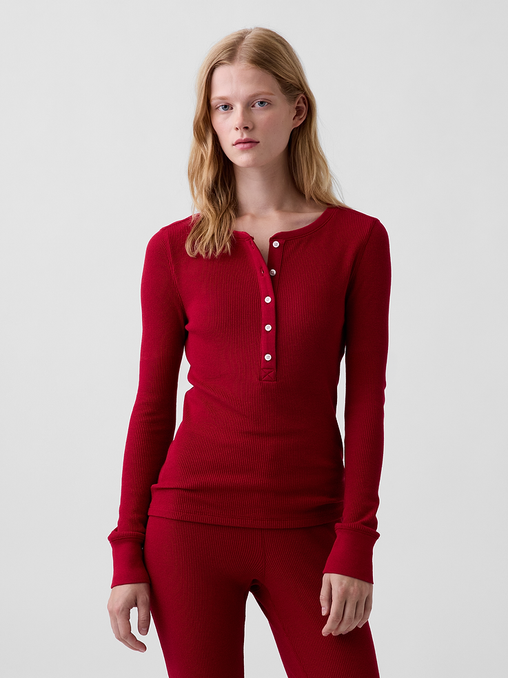 Image 1 of 4, Soft waffle-knit Henley pajama top., Crewneck with front button placket., Long sleeves with banded cuffs., This product was made in a factory that invests in gender equity and women’s empowerment through RISE. Learn more at gapinc.com/equity ., Product #1186857