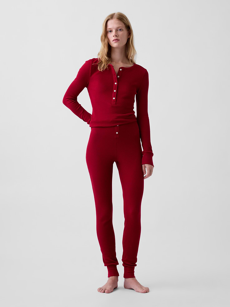 Image 1 of 6, Soft, stretch waffle-knit pajama leggings., Elasticized waist with faux button fly., Banded rib cuffs., This product was made in a factory that invests in gender equity and women’s empowerment through RISE. Learn more at gapinc.com/equity ., Product #1186865