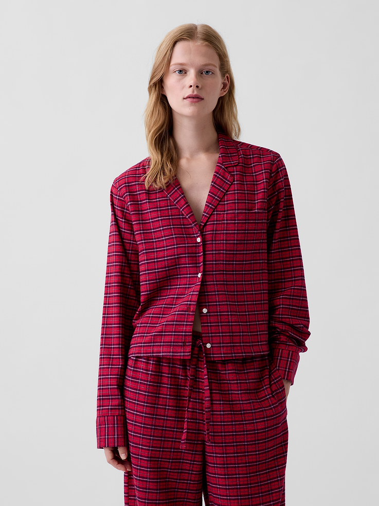 Image 1 of 3, Soft flannel cotton button-up pajama shirt. In a relaxed fit and cropped length., Notch collar, button front., Chest patch pocket., Straight hem., Allover plaid., This product was made in a factory that invests in gender equity and women’s empowerment through RISE. Learn more at gapinc.com/equity ., Product #1186854