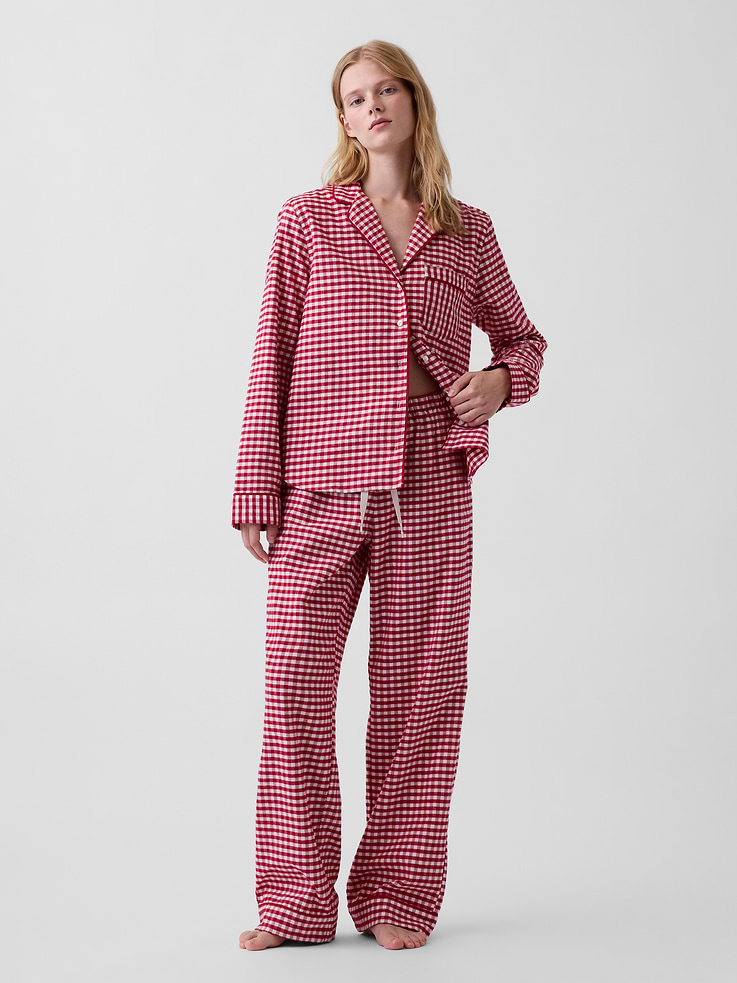 Image 1 of 3, Our softest flannel ever. Double washed for extra softness. Fully relaxed for easy comfort. Universally perfect for absolutely everyone., Supersoft cotton flannel pajama shirt and pants PJ set. In an relaxed fit., Notch collar., Long sleeves., Button front., Chest patch pocket., Elasticized waist with drawcords., Side slant pockets., Allover print., This product was made in a factory that invests in gender equity and women’s empowerment through RISE. Learn more at gapinc.com/equity ., Product #1186866
